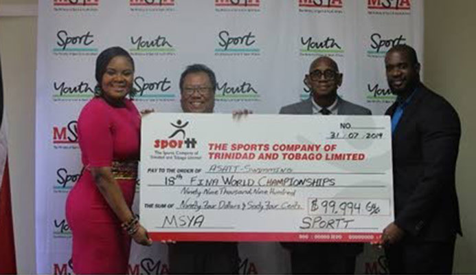 ASATT president Lindsay Gillette (second from left) collects a cheque from Sports Minister Shamfa Cudjoe (left), with Anthony Creed, executive manager at SPORTT (second from right) and Gabre Mc Tair, assistant director of Physical Education and Sport, looking on. PHOTO COURTESY MINISTRY OF SPORT AND YOUTH AFFAIRS