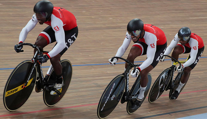 T&T’s cyclists  Keron Bramble, Njisane Phillip and Nicholas Paul competing in the men's team sprint qualifying round at the Pan American Games in Lima, Peru, yesterday. (AP) @Fernando Llano