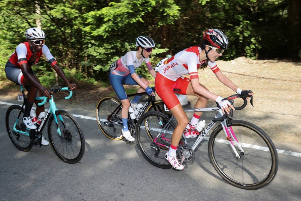 In this July 25 file photo, TT's Teniel Campbell (L), Britain's Anna Shackley (C) and Japan's Hiromi Kaneko ride during the women's cycling road race of the Tokyo 2020 Olympic Games finishing at the Fuji International Speedway in Oyama, Japan. On Saturday, Campbell placed second, at the Pan Am Road Cycling Championships, held in the Dominican Republic. - (AFP PHOTO)