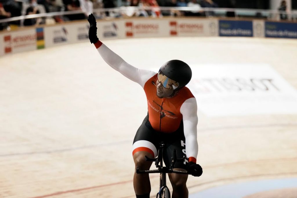 Trinidad and Tobago's Nicholas Paul waves during the men's 1 km time trial race at the UCI Track Cycling World Championship in Roubaix, north of France, on Friday. (AP Photo)