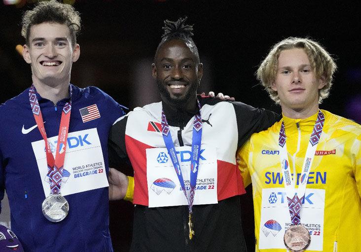 PODIUM PRIDE: Silver medallist Trevor Bassitt, of the USA, from left, gold medallist Jereem Richards, of Trinidad and Tobago, and bronze medallist Carl Bengtstrom, of Sweden, pose with their medals on the podium of the Men’s 400 metres at the World Athletics Indoor Championships in Belgrade, Serbia, on Saturday. --Photo: AP