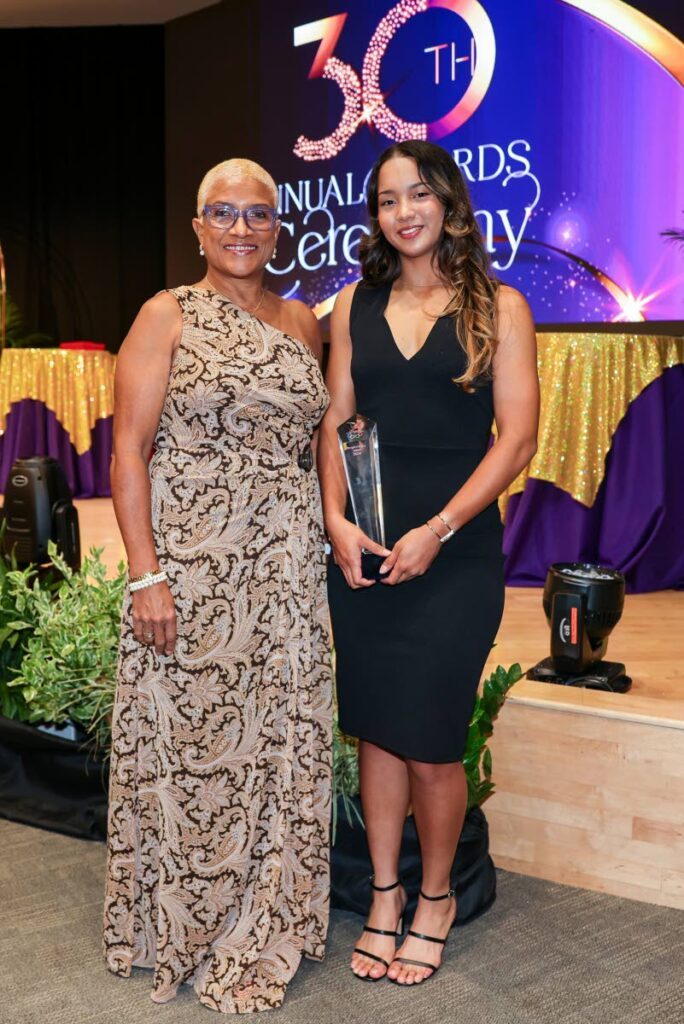 Trinidad and Tobago Olympic Committtee (TTOC) president Dianne Henderson (L) and the TTOC’s 2024 People’s Choice Award recipient junior cyclist Makaira Wallace attend the TTOC’s annual awards ceremony, on December 29, at the Government Campus Plaza Auditorium, Port of Spain. - Photo by Daniel Prentice (Image obtained at newsday.co.tt)