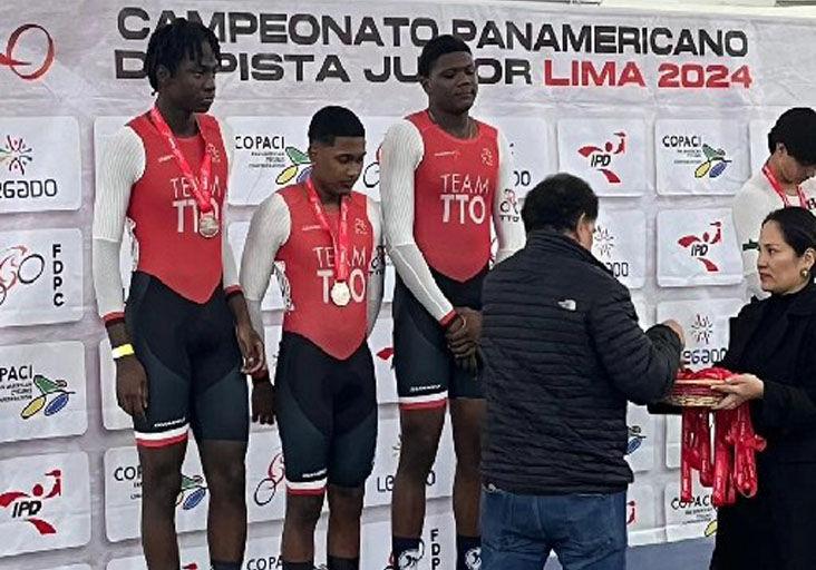 MEDALLISTS: Trinidad and Tobago team sprinters from left, Jelani Nedd, Syndel Samaroo and Danell James stand on the prize rostrum with their silver medals at the 2024 Pan Am Junior Cycling Championships in Lima, Peru, Wednesday. (Image obtained at trinidadexpress.com)